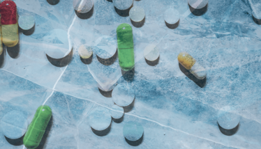 Pills concealed under cracking ice